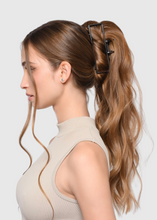 Load image into Gallery viewer, large dark gray metal claw clip styled in ponytail on model
