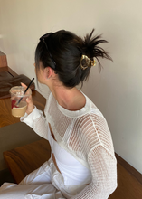 Load image into Gallery viewer, Gold metal claw clip in ponytail style on woman drinking coffee
